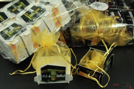 توزيعات  كرتون مع تل حج و عمرة