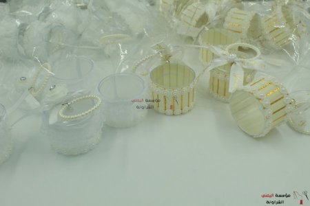 توزيعات علب اكريلك مع يد لولو
