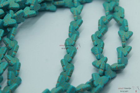 خرز فيروز شكل فراشة
